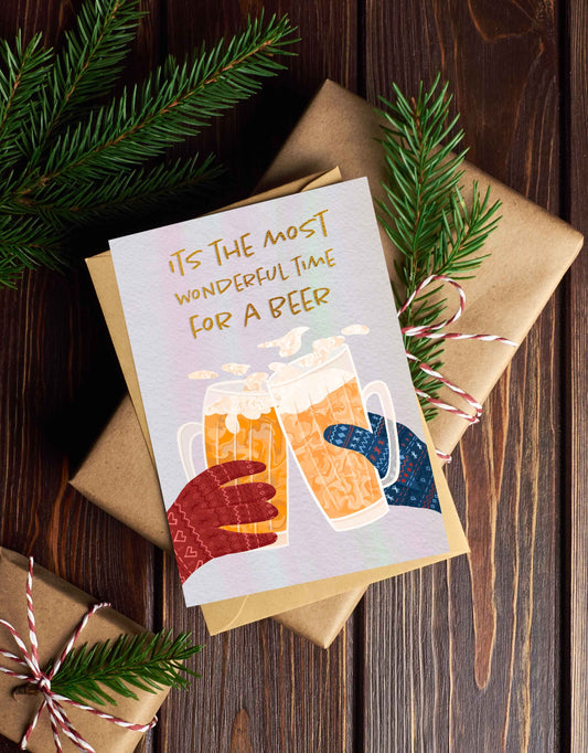 Gift card with beer illustration on a wooden surface